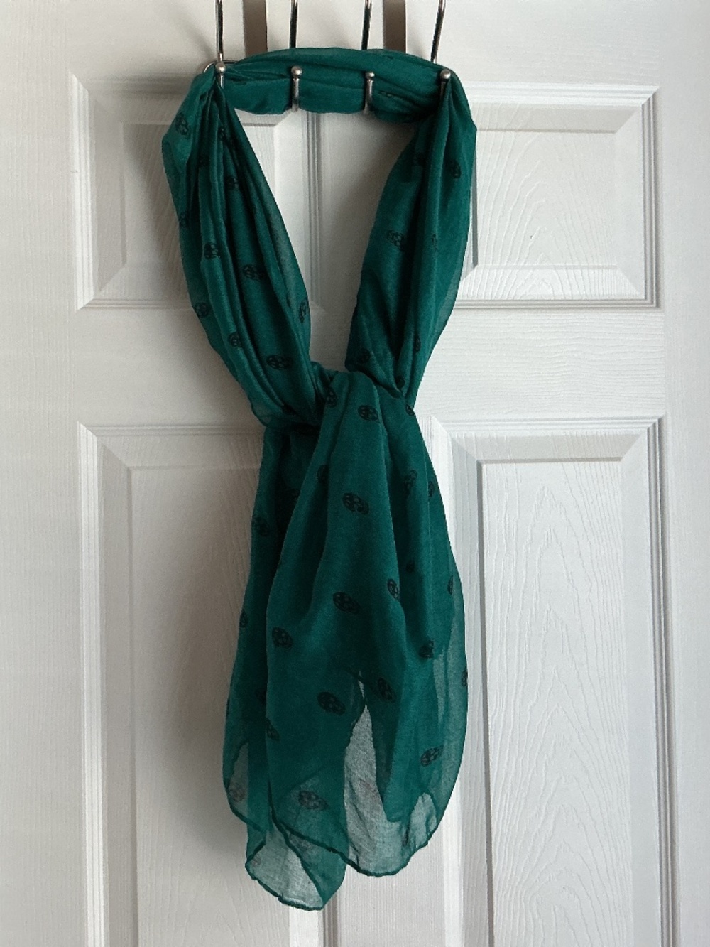 Green 55” x 45” scarf with skulls